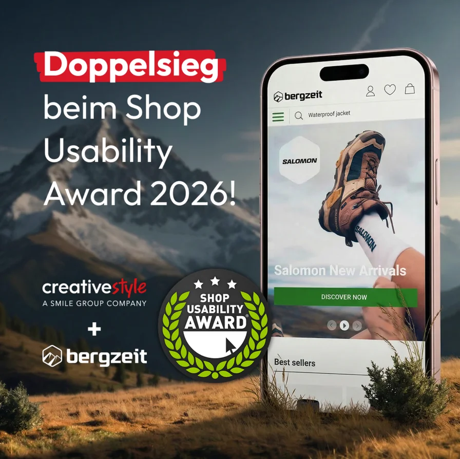 Smartphone displaying an online store with hiking boots, showcasing two awards. Text highlights "Doppelsieg" and "Shop Usability Award 2026!"